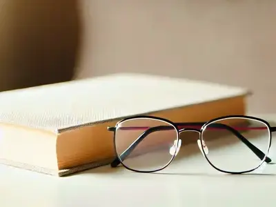 Glasses and book