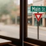 Side-by-side view comparing blurry nearsighted vision with sharp normal vision through a city window scene.
